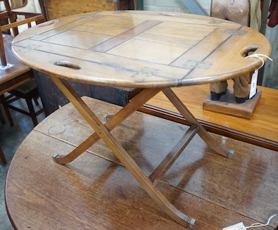 A reproduction George III style mahogany butler's tray on folding stand, width 87cm, depth 64cm, height 55cm